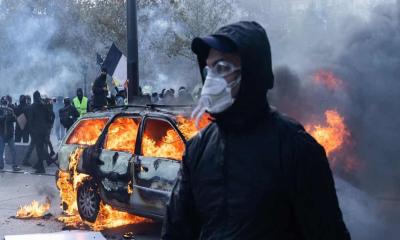 Building Set Ablaze and 1,200 Arrested During Nationwide French Protests