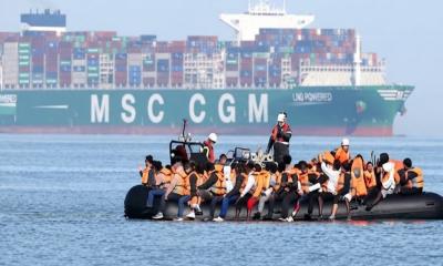 Over 150 migrants rescued in English Channel after boat fire