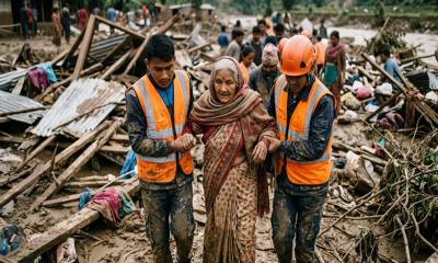Nepal floods: 97-year-old woman pulled alive from rubble