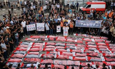Gaza rubble yields remains of 100 people for burial