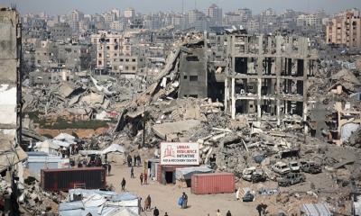 Israeli strike on Gaza kills two and wounds 13